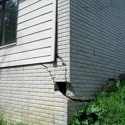 A damaged foundation with wall cracking in Tolleson